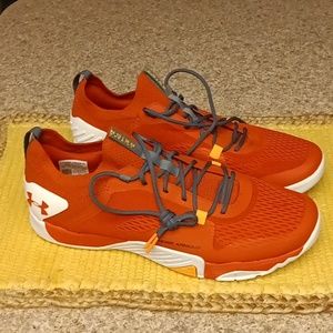 Under Armour sneakers size 12 new without tags orange white and gray lace up